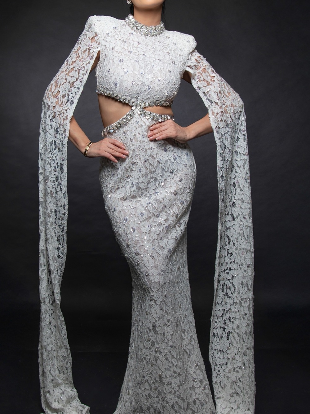 Embellished White Lace Cutout Evening Gown with Dramatic Long Sleeves